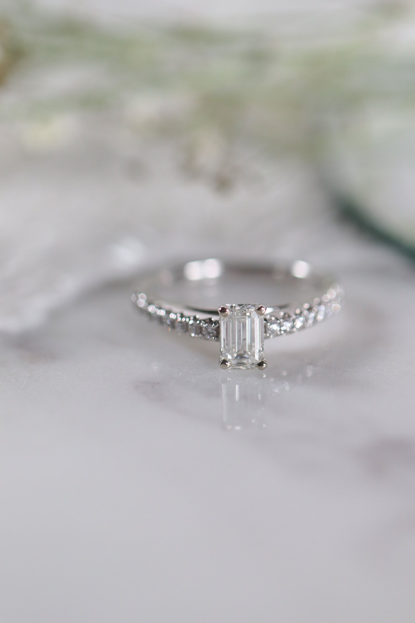 0.80 Ct Emerald Cut with Accented Band