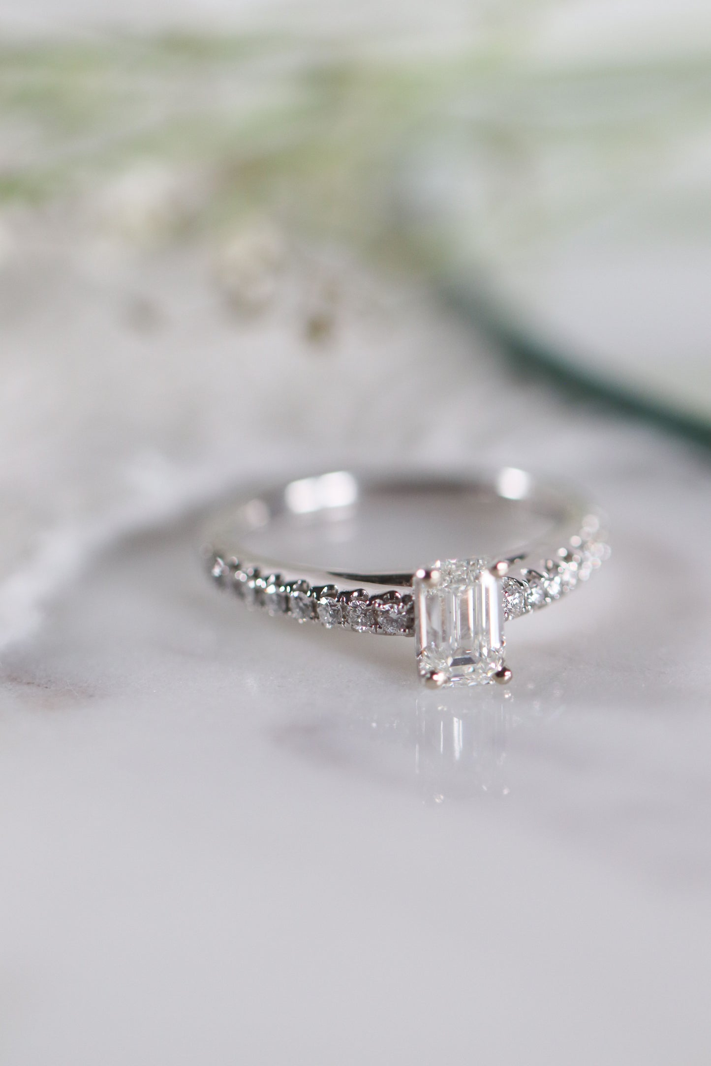 0.80 Ct Emerald Cut with Accented Band