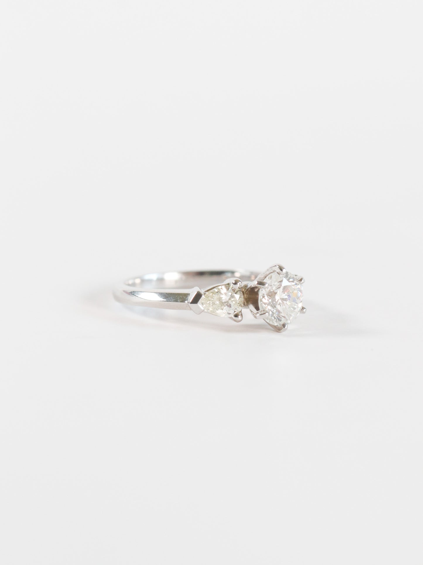 SPFJ- Round Diamond with Pear Side Stones