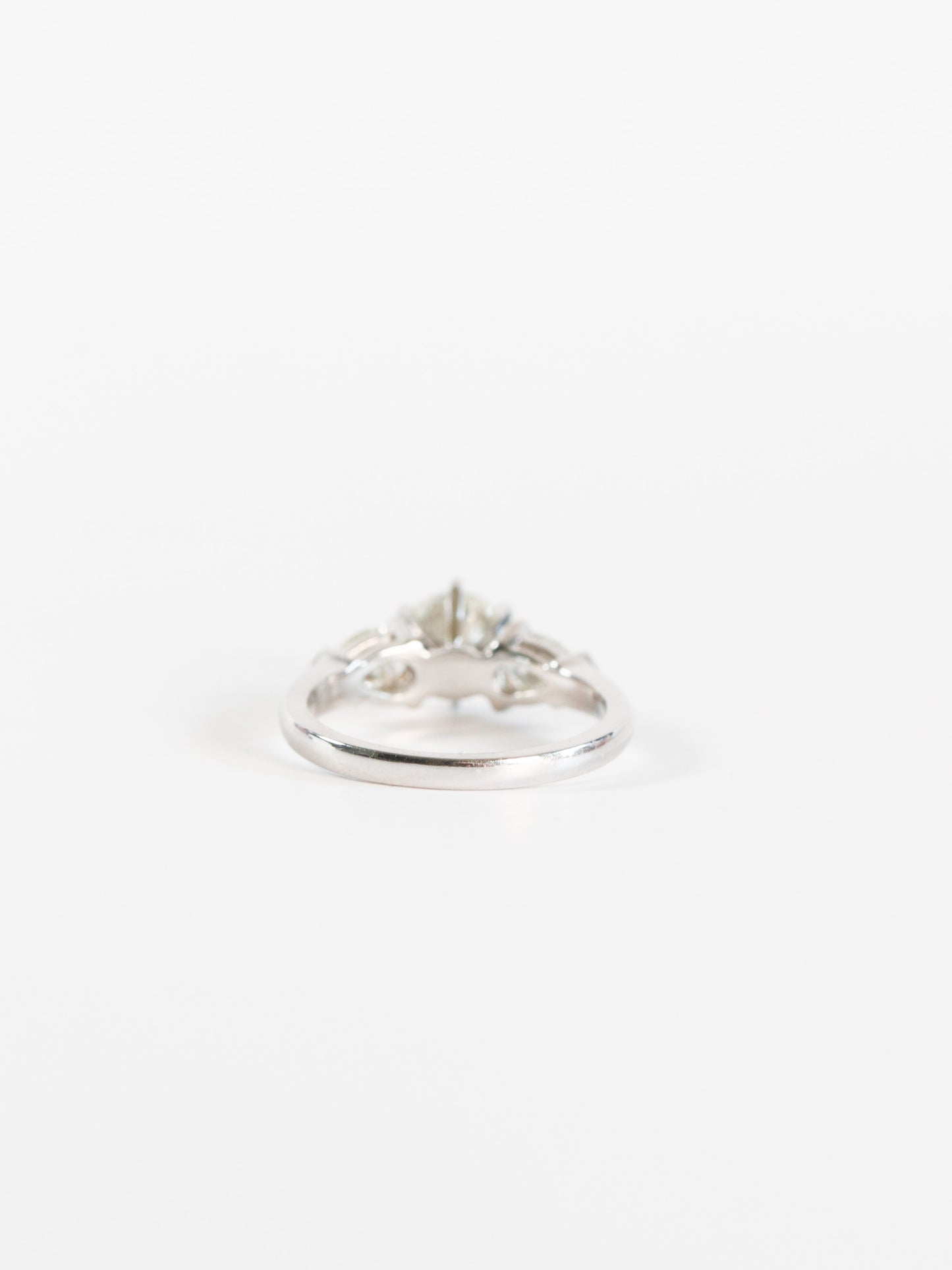 SPFJ- Round Diamond with Pear Side Stones