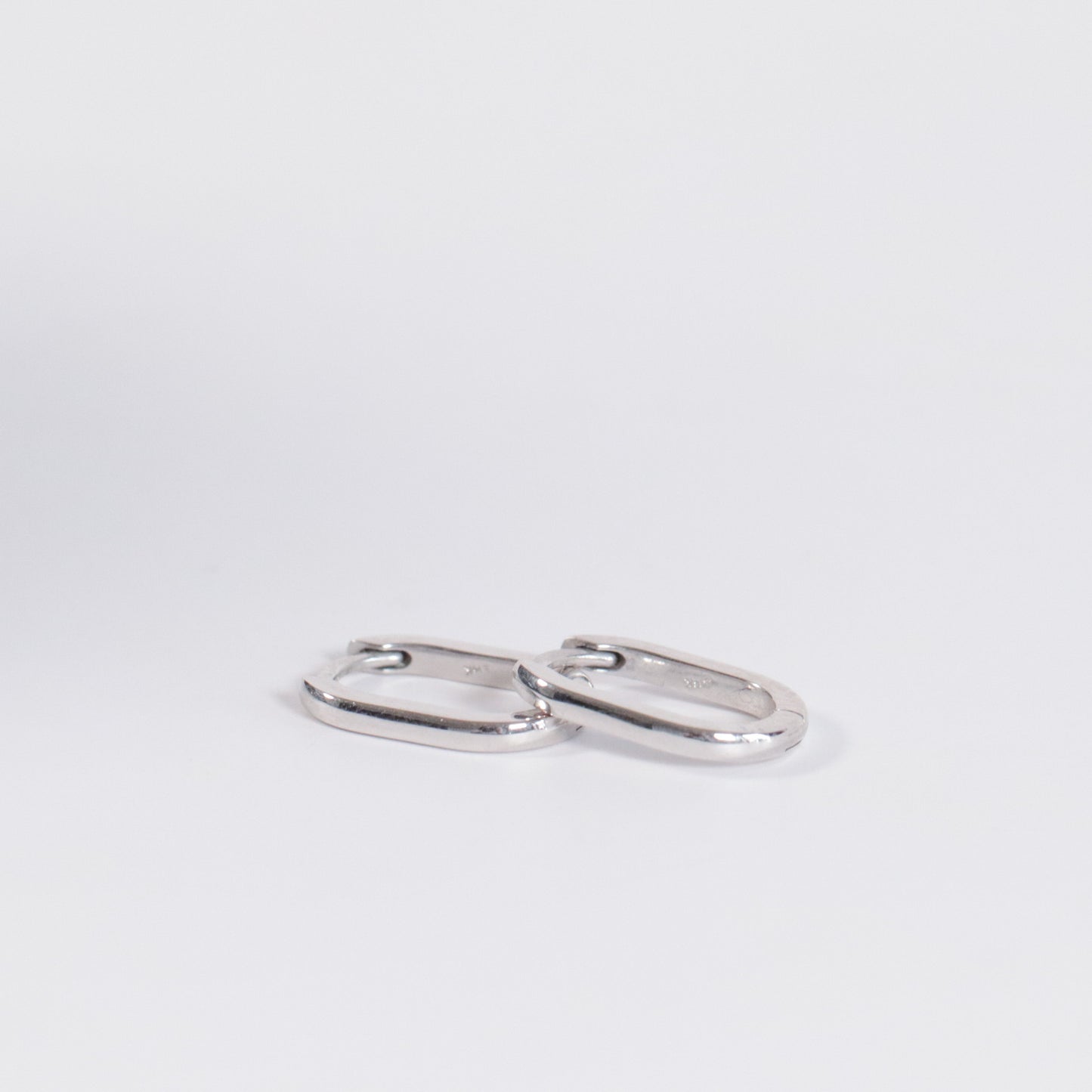 Elongated Oval Huggie Hoops