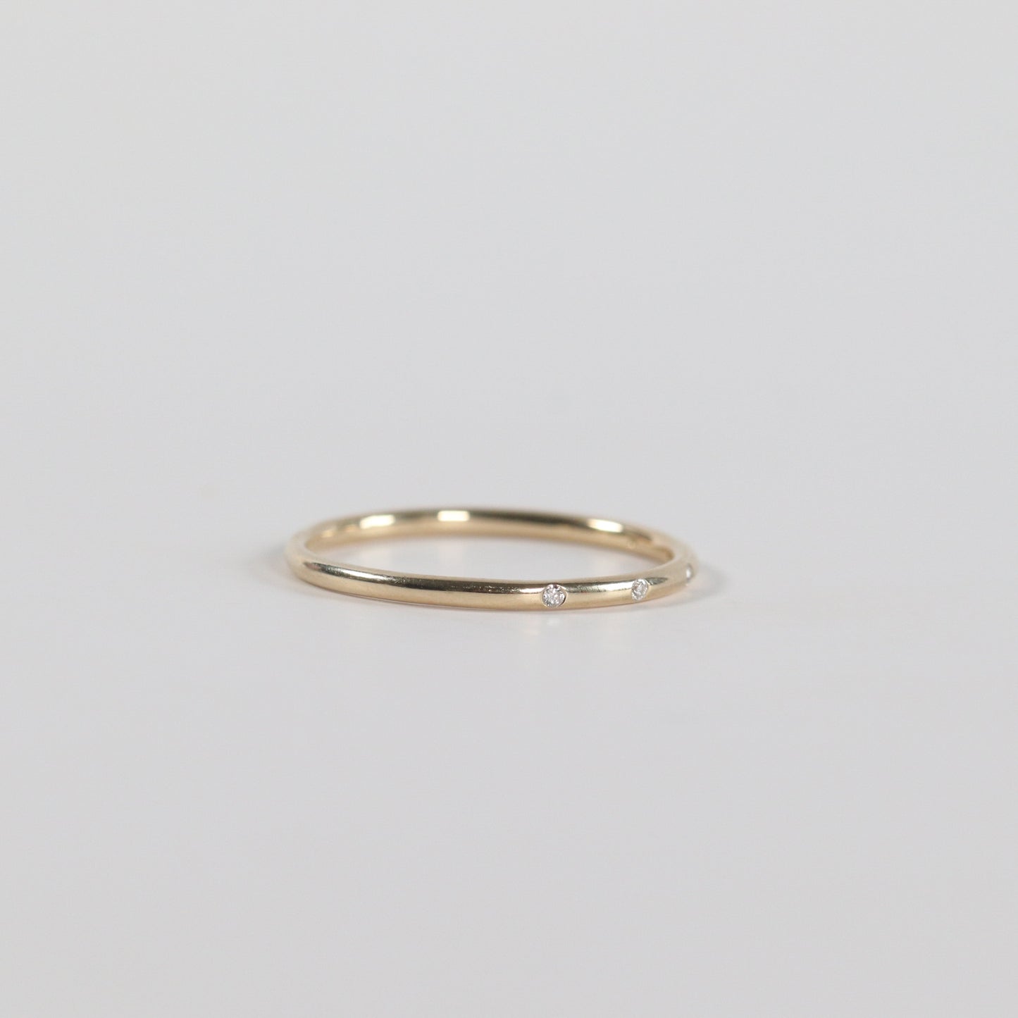 Dainty Flush Set Diamond Band