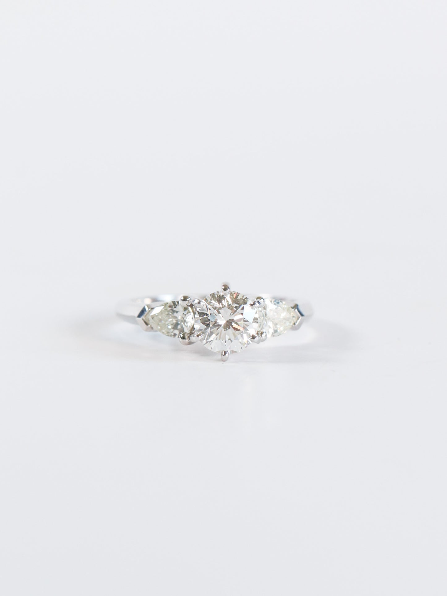 SPFJ- Round Diamond with Pear Side Stones