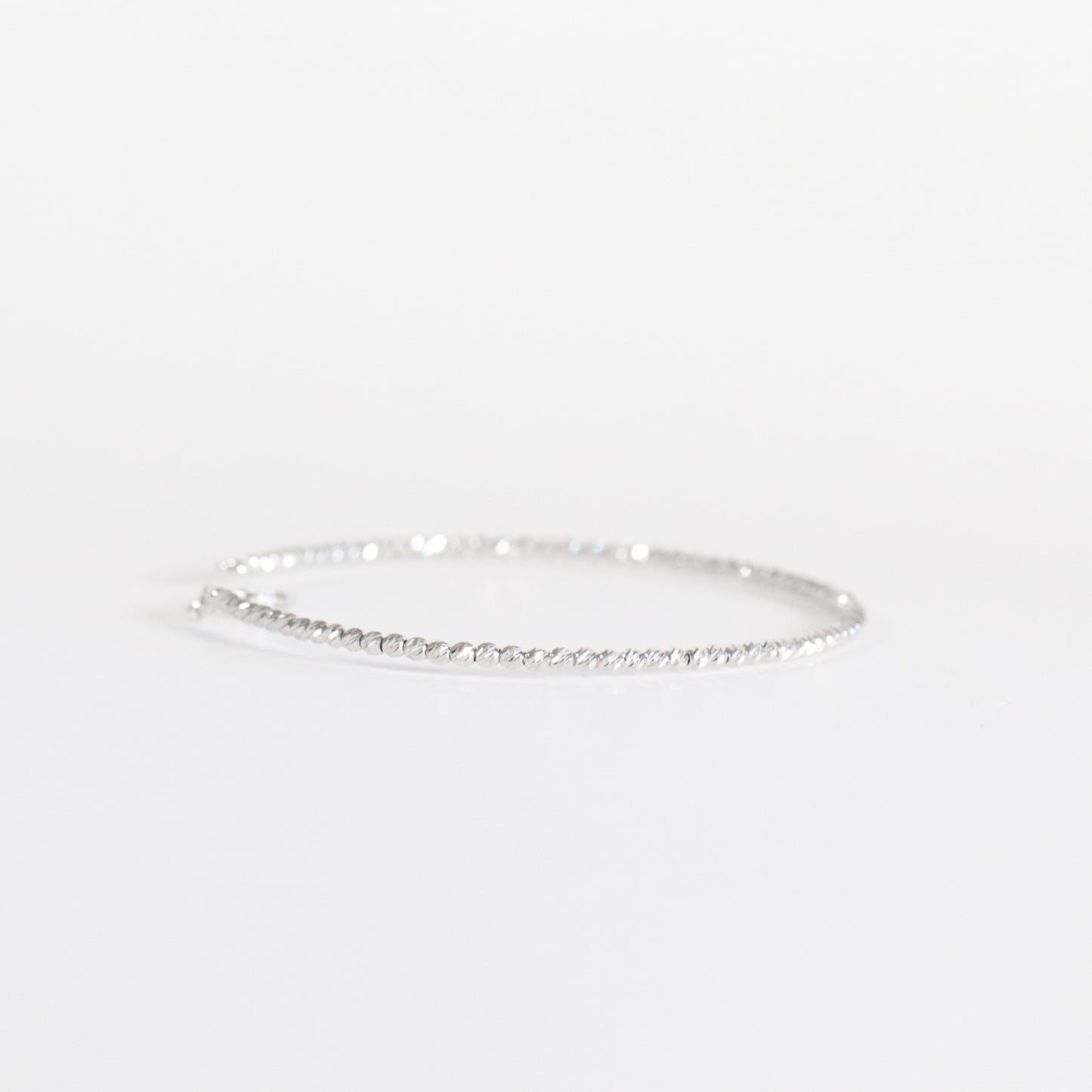 White Gold Diamond-Cut Bead Bangle